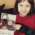 Vivien Lyra Blair Instagram - I like to read the scripts and the books that the movies I do are based on. Here’s me reading #dearzoe by @philipbeard17 😻 I really liked it I think you will to if you like books like this 👀