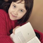 Vivien Lyra Blair Instagram - I like to read the scripts and the books that the movies I do are based on. Here’s me reading #dearzoe by @philipbeard17 😻 I really liked it I think you will to if you like books like this 👀