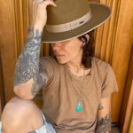 Whitney Mixter Instagram - Clearly I love a hat🧡 When I’m traveling I always take one with me that I know I can rock in all the vibes. Shoutout to @brixton for making this Reno Fedora so easily versatile. Def a go to for 🛫. What’s the fav look here? You can also find it via @fromthelobby in the link in my bio #brixton #hats #hatstyle