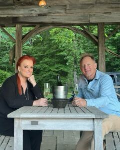 Wynonna Judd Instagram - Part 2 ✌🏼 of last week’s birthday festivities! Everyone who knows me, knows that I am not a fan of surprises!!! I knew that something was planned for my actual birthday, but wasn’t sure what. I was told to drive to the gazebo (where Cactus and I got married) at 6:30pm. We arrive, expecting a group of people to yell “surprise!” Much to my surprise, we find nothing besides a bottle of champagne and two glasses. 🥂 A peaceful, quiet moment with my sweetheart in the midst of a very busy week. We’re then instructed to drive to one of our favorite spots on the farm, a spot we’ve recently named “Peaceful Creek.” My dear family and chosen family have gathered for the most beautiful dinner IN the creek, and even flew in one of my favorite chefs @chefbobbymarcotte to cook for us. Thank you to everyone who understands my heart’s desire! Family, friends, and fellowship at my favorite place on earth…HOME. 💛 📷: @hayleyshoots