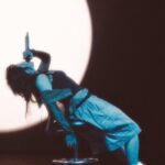 Yaeji Instagram - to all the onions who showed up for our eu/uk tour — thank you thank you thank you. it was my first headline tour in europe (!!) and it was a tour with many unexpected challenges. one of our dancers got injured mid-tour and we had to make quick adjustments to the show to work as a two-person performance. it’s not easy to be vulnerable in front of a big group of people u havent met before, to express your deepest personal thoughts and experiences to strangers from a different culture, who speak a different language. but touring reminds me that despite all our differences, we are all here together because something in us resonated. and that resonance goes beyond language. we are all humans. we all came from one thing and will go back to one thing. we all have a heart, and the heart is a muscle. a muscle is to be used over and over to grow stronger 💪 so let us not stop feeling! let us feel joy and love, but also be confused, angry, and sad. let us not normalize genocide. let us not normalize apartheid. thank u for giving me courage on the road onions 💗 my body mind and soul feel more aligned thanks to you and this tour. til next time 🫰💌 📸 @daria.msdv