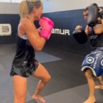 Yana Santos Instagram - In the zone and ready to dominate. 💥 Fueling my training with @QNLabs🔥 Get sharp with code “Yana” and score 15% off today! #Fighter #QuantumNutritionLabs #UFC #MMA #Workout
