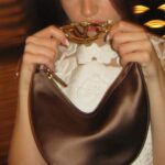Yara Mustafa Instagram – double vision @maisonvalentino #vlogomoonbag