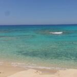 Yasmine Ghaith Instagram - One of the most beautiful beaches I've ever been to 💙 A mix of the beautiful Turquoise North coast water with the smoothest white sand, and the clarity of Mykonos beaches, along with the vibe of the south Spanish coast 💙 A mix from heaven only in @jefairatown #WonderWomanAroundTheWorld #NorthCoast #Summer #Beach #Sun #Sand #Turquoise #CrystalClear