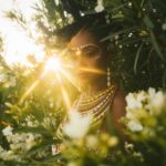 Yaya DaCosta Instagram - is YORUBA. The Yoruba people of West Africa inhabit parts of present-day Benin and Togo, but are predominately and most famously one of the three largest ethnic groups in Nigeria. Our origins trace back to at least the 10th century B.C. in Ile-Ife (in present day southwestern Nigeria), where it is believed the orisa Oduduwa descended to Earth to create the world. While many Yoruba peoples on the continent of Africa are Christian or Muslim, the Yoruba diaspora consists of descendants of kidnapped and enslaved people who were dispersed across South America, The Caribbean, and North America, many of whom still keep traditional Yoruba spiritual practices alive. The Yoruba are also known for being skilled craftsmen, farmers, and masters of the marketplace. . Channeled Message: Greatness. Why hesitate when you come from greatness? Why limit yourself when you were born to do a bililion beautiful things? You, with roots that have stretched across lands for centuries, You, with the perseverance to uphold countless generations… The words we have spoken, The deities we have venerated, The divination tools we have perfected, Have had such staying power in every place they arrived, That even across borders, oceans and seas, Even cloaked in diverse religious dogma, We see ourselves. A change of spelling here, An alternate interpretation there… The soul of what sustains us was never lost in translation. Get to the Essence of everything. And infuse it with the staying power that runs through your veins. Blood. Èjè Àse Life force energy. Excellence. Creativity. Rhythm that echoes the pulse of the planet. Dance to that. And do not be afraid to shine. Adorn yourself And celebrate your existence Daily. . 📸: @thaisaquinophotography 💇🏾‍♀️: @chiomanvhair who used a traditional Nigerian wrapping technique to create a family tree with my hair. 🎵: Konkere Beats “ Dundun Instrumental Ensemble” . #AncestryDecolonized #BlackFuturism #IndigenousFuturism