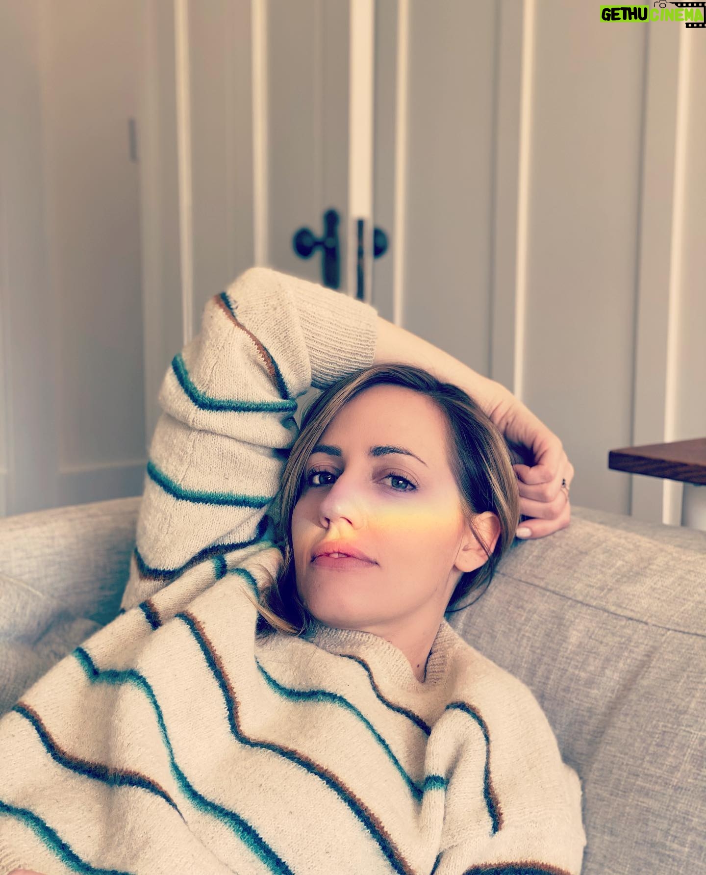 Zibby Allen Instagram - Photo/Video dump of moments in my album that I have zero memory of but am enjoying wondering about these various states I was in. (Time is weird dude.) 1 - The place we stay in Vancouver has a lot of beautiful stained glass which casts rainbows into the house. Guessing @adamjamesblair snapped this pic when I was chillin, no idea a rainbow was parked on my face. 2 - This vid definitely occurred in my trailer while filming #virginriverseason4 but I donβt remember this dance-y moment at all!? I do often play music and dance it out while waiting for my hair to set though. ππ€¦ββοΈ π π΅ #virginriverbts 3 - Forgot about this look from a photo shoot I did with @theportraitsessions Haha. Iβm obsessed with my cute little Cactus pin from @wkndrsforlife (I might have also been covertly auditioning for a #KevinCostner project here π€ ) 4 - One of many moments where Iβm laying on a table at a beauty clinic wondering what the hell Im doing to myself, probs π
5 - Husband must have taken this πΈ. Kona is my Chill and Nap Trainer. It appears this was a successful session. #dontforgettonap