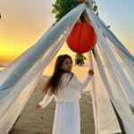 alismita goswami Instagram – In the quiet of dusk, the sun’s fiery art,
Colors the sky, a masterpiece of heart.