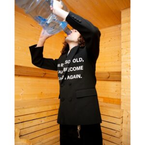 A. G. Cook Instagram - Spilling water on my laptop is my ultimate nightmare, so couldn’t resist this therapeutic shoot for the @kingkongmagazine liquid issue 💧 Available to pre-order now, featuring my conversation with @ghostwoodfox 💧 Photos @maxcgranger 💧 Creative   styling @daliah.spiegel 💧 Make up @koseikitada 💧 Hair @mthr0905 💧 Prop styling @gracesnellock 🚱