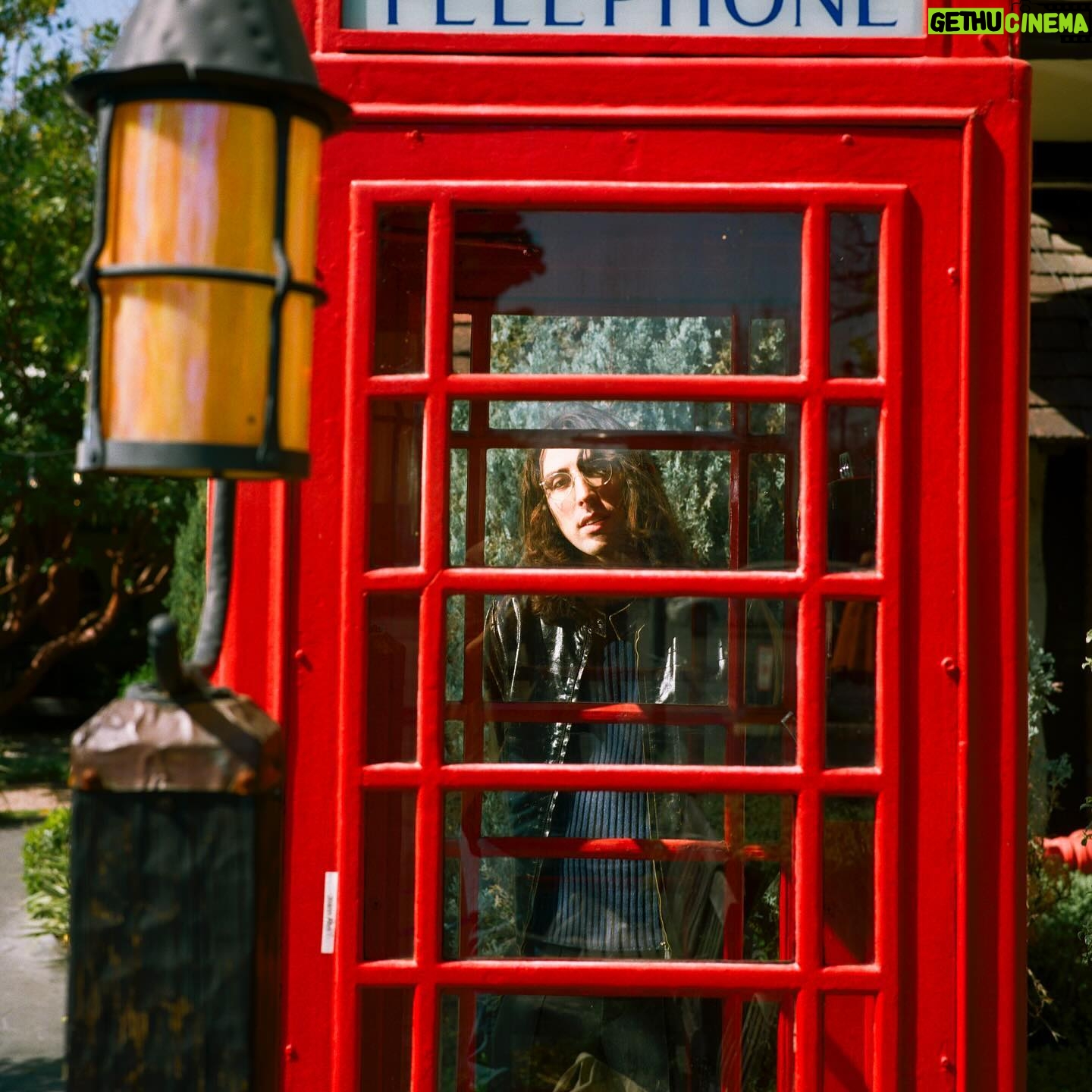A. G. Cook - 7.2K Likes - The ultimate Britpop dork 📞 Cover feature for @readdork 📞 Photos by @strange.victory 📞 Styled by @shigecki @sofiashowandtell 📞 One of LA’s finest red telephone boxes ❤️🔥