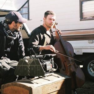 Aaron Marciniak Instagram - What you’ve never seen a cowboy play a cello before? 🙃 I can’t decide if this is the strangest photo I’ve ever seen or the best photo I’ve ever seen. 🤔
On the set of @deadmenwestern showing on #amazonprime #redcinema @reddigitalcinema