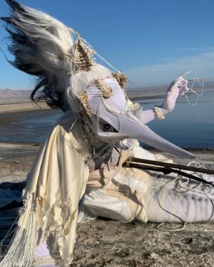 Abhora Instagram - Ghost Shark, or Caught and Forgotten

Corset by @houseofcanney 
Hair by @fenabarbitall 
Photo by @vampirechinese 
Accessories by @shrinkle 
Special assisstance by @hailsatanna 

My Sea Monster challenge is dedicated to the mysterious beauty if the Salton Sea. Its such an enchanting place with a rich and tragic history of once being a unique body of water completely landlocked in the desert. Once a highly saught after resort town now lies in ruin due to rising salt levels due to a myriad of factors. Most of which being agricultural runoff, but the blame lies in a lack of congressional interest. A distinct feature to this place is the indescribable smell of exposed sea bed and the massive graveyard of fish corpses. Its a beautiful community worth saving! Save Our Seas!