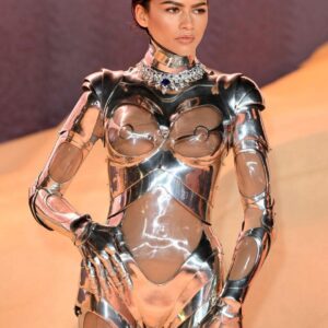 Adi Granov Instagram - I really like Zendaya, but to see her wearing Thierry Mugler's 1995 cyborg "Machinenmensch" suit blew my mind. I am a huge Mugler fan. I even got to see my own work exhibited next to this exact suit Zendaya wore at the Met in NYC in 2008. @philjdsaunders and I were invited to speak there and have our Iron Man Mk2 suit in the exhibit. It was an awesome experience, but I was more excited to see all of the Mugler pieces. Too bad my 2008 camera was potato quality.

I just wish Zendaya wore the headpiece as well.

#ironman #thierrymugler #zendaya #adigranov