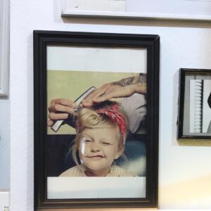 Aimee Mullins Instagram - Vintage store, Paris. Behind the cash register is a pic that can only be the kindergarten photo of the kick-ass bandana-wearing makeup artist on #strangerthings ❤️ you @lastloox