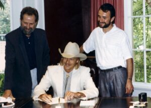Alan Jackson Instagram - #RememberWednesday when Alan signed his first record deal. Within the same year, he released his debut album titled #HereInTheRealWorld.