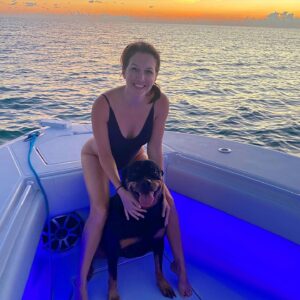 Alessandra Torre Instagram - Took the boat out for dinner and the sunset. The trip was Whiskey approved. ☺️ #authorlife #rottweiler