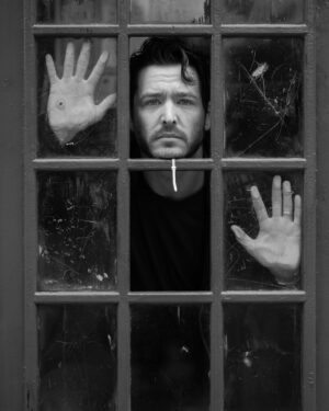 Alexander Vlahos Instagram - Spent the morning with the 📸 wizard @joelynntw - snapping away while I showed off my ice hockey collection. We sat in a children’s park for a bit, that was fun. Also snuck into a church. Both hugely successful.
