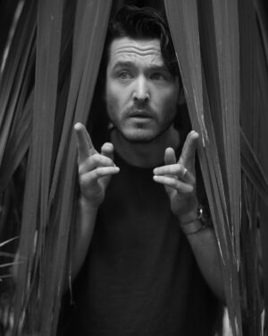 Alexander Vlahos Instagram - Spent the morning with the 📸 wizard @joelynntw - snapping away while I showed off my ice hockey collection. We sat in a children’s park for a bit, that was fun. Also snuck into a church. Both hugely successful.