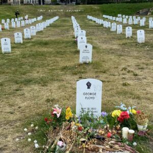 Alexandra Holden Instagram - Last week I was honored to visit George Floyd Square in Minneapolis.  It was chilling to be at the actual site of his murder, and an incredibly moving and enlightening experience. 

  It was beautiful to see the people in George Floyd Square come together to preserve the creative expressions of turmoil and hope for the future. 

  I had the privilege to speak with Remi Douah who is working to break the stigmatization of therapy simply by sitting in a chair overlooking an art installation and opening a dialogue.  Stop by and say hi or visit www.856s.org to see how you can help. 
 
  The “Say Their Names” art installation created by Anna Barber and Conner Wright features over 100 tombstones of African Americans who have died at the hands of law enforcement.  Aiyana Jones was only 7 years old.  Each tombstone it’s own tragedy.  They continue to add to the installation.

“Injustice anywhere is a threat to justice everywhere” — Martin Luther King Jr. 

@gfgmemorial #icantbreathe #saytheirnames #blm