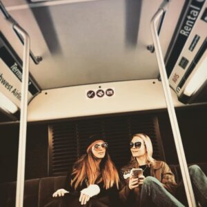 Alexandra Holden Instagram - Back of the bus, where we belong🚍🕶🦋#travellingthroughtheworld #rentalcarshuttle #makingboringthingsfun