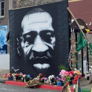 Alexandra Holden Instagram - Last week I was honored to visit George Floyd Square in Minneapolis.  It was chilling to be at the actual site of his murder, and an incredibly moving and enlightening experience. 

  It was beautiful to see the people in George Floyd Square come together to preserve the creative expressions of turmoil and hope for the future. 

  I had the privilege to speak with Remi Douah who is working to break the stigmatization of therapy simply by sitting in a chair overlooking an art installation and opening a dialogue.  Stop by and say hi or visit www.856s.org to see how you can help. 
 
  The “Say Their Names” art installation created by Anna Barber and Conner Wright features over 100 tombstones of African Americans who have died at the hands of law enforcement.  Aiyana Jones was only 7 years old.  Each tombstone it’s own tragedy.  They continue to add to the installation.

“Injustice anywhere is a threat to justice everywhere” — Martin Luther King Jr. 

@gfgmemorial #icantbreathe #saytheirnames #blm