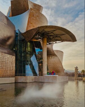 Alexandra Munroe Instagram - Congratulations to Guggenheim Museo Bilbao on her 25th anniversary and to our esteemed founding director Juan Ignacio Vidarte! The visionary museum has changed our ideas of what museum architecture can be, how artists can respond to swirling spaces, outdoor environments and an urban plaza, and how bold museum leadership can defy and outlast entrenched cultural parochialism. Here, Fujiko Nakaya’s Fog, Jeff Koons’s Tulips, and Anish Kapoor’s totem of reflective spheres play in tandem with Frank Gehry’s exuberant architecture. Viva Bilbao! 

@guggenheimbilbao @guggenheim @jeffkoons @anish.kapoor #fujikonakaya #25thanniversary #genius #bilbao