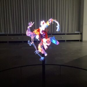 Alexandra Munroe Instagram - At Julia Stoschek Collection in Berlin last week, this hologram by Cyprien Gaillard greets you at the entrance of the current show, Fire in My Belly. Here, a mythical monster looking like an Indonesian shadow puppet emerges from the light, endlessly devouring it’s own head. Gorgeous and uncanny, it haunts me still. 

@juliastoschekcollection @cypriengaillard #berlin #hologram