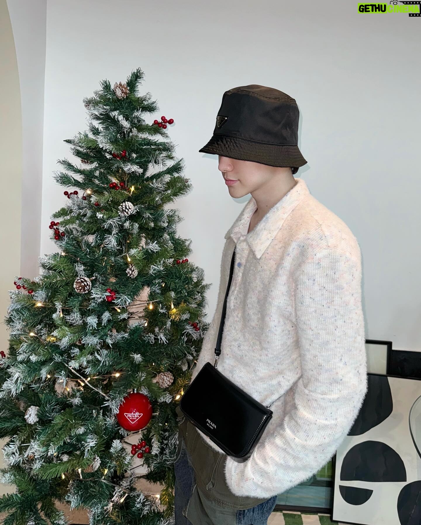 Alfred Sng - 2.6K Likes - Still riding the festive jolly wave! 😼 #PradaHoliday23 @prada