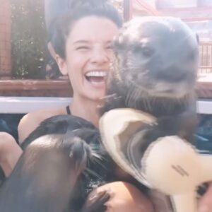 Alice Greczyn Instagram - That one time I swam in a blur of #otters at @nurturedbynatureotters! #🦦 A visit to this animal sanctuary near San Diego makes one of the most memorable #dateideas, #birthdaygifts, and #bucketlistadventures! Not only do they have otters—they have #capybaras, kangaroos, wild cats, and so many other critters, too!

If you or someone you love is an a#animallover looking for a once-in-a-lifetime splurge, go here!! (#notanadjustafan!)