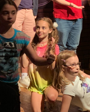 Alicia Minshew Instagram - Oh ya know my pig-tailed 9 year old is just doing her stand-up comedy at the @broadway_comedy_club! So proud of her and this fearless group of NYC kids who wrote their own material and performed it last week for the public! Thank you to #broadwaycomedyclub for creating such a fun comedy camp for these amazing kids! The last photo is my fav. You can spot my lunatic in that group! 😝#broadwaycomedy #summercamp #comedian #improv #standupcomedy #nyckids #nyc #fearless #laughter