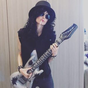Alicia Minshew Instagram - This is my favorite time of year 🎃! I love playing dress up! Going back 2 years ago when I was rocking my @slash costume with my blowup guitar 🤘😆. I may have to bust out with it again. I loved being a dude with hair like mine..
Whatcha gonna dress as?