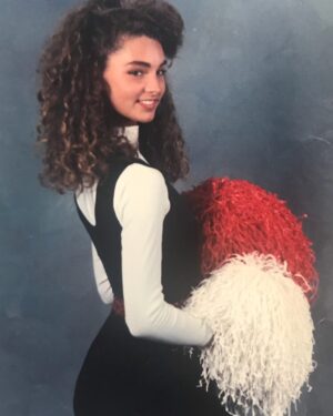 Alicia Minshew Instagram - Lookie what I found! You know I love my throwbacks! 🤣 Who is this girl?! This is from my dance corp days. There are no words for this. The hair. The eyebrows. The pose. My bangs don't even fit in the photo. My bangs! 😝 Epic. 1989 baby. And why did we wear turtlenecks in Florida?! There are so many wrong things in this photo. 😭 #throwbackthursday #1980s #bighairdontcare #floridagirl #pompoms
