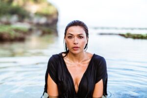 Aliyah O'Brien Instagram - Oh my goodness you guys!
I have endless photos of me in my ELEMENT (barefoot, beached, barely clothed) taken by my absolute favorite, most talented babe ever @kristineilana of @theportraitsessions 🥰

And because I’m still a little afraid at times of being “too much”, I’ve barely posted any 🙈

Good gawd!
No more of this!

I came across these photos and was like jeeezus why don’t I ever post these?!
I need to post these for Kristine because she’s so fucking good (seriously though we shoot for like 15 min. and she captures so much gold! Her super power is really seeing you and capturing that authenticity. Hire her, fly her out to you, it’s worth it!).

But really, I need to post these for me.
Because I’m no longer the girl who’s afraid to shine because she might get ousted by her grade school crew. 
I’m no longer the woman who’s afraid people won’t see past her physical appearance to her heart.
I’m no longer the part of me that thinks she isn’t valuable if she’s not attractive, or the part of me that judges that part for thinking that because she’s not evolved enough 🙃

I was never those parts, 
I just wasn’t aware at times of the deeper truth.

These parts of me may still  speak up from time to time, I may still forget, I may opt to play small…
But the big love energy that I truly am is becoming a more familiar resting place,
and that love has the space and compassion to see these parts, love on them hard, and then free them to shine 🌟

May we all find our way to the soft bed of our hearts, and from this juicy place, feel the courage to 
SHINE BABY SHINE✨💖✨

You are love 🫶
Love you 💋