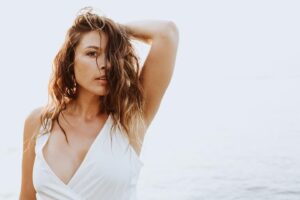 Aliyah O'Brien Instagram - Oh my goodness you guys!
I have endless photos of me in my ELEMENT (barefoot, beached, barely clothed) taken by my absolute favorite, most talented babe ever @kristineilana of @theportraitsessions 🥰

And because I’m still a little afraid at times of being “too much”, I’ve barely posted any 🙈

Good gawd!
No more of this!

I came across these photos and was like jeeezus why don’t I ever post these?!
I need to post these for Kristine because she’s so fucking good (seriously though we shoot for like 15 min. and she captures so much gold! Her super power is really seeing you and capturing that authenticity. Hire her, fly her out to you, it’s worth it!).

But really, I need to post these for me.
Because I’m no longer the girl who’s afraid to shine because she might get ousted by her grade school crew. 
I’m no longer the woman who’s afraid people won’t see past her physical appearance to her heart.
I’m no longer the part of me that thinks she isn’t valuable if she’s not attractive, or the part of me that judges that part for thinking that because she’s not evolved enough 🙃

I was never those parts, 
I just wasn’t aware at times of the deeper truth.

These parts of me may still  speak up from time to time, I may still forget, I may opt to play small…
But the big love energy that I truly am is becoming a more familiar resting place,
and that love has the space and compassion to see these parts, love on them hard, and then free them to shine 🌟

May we all find our way to the soft bed of our hearts, and from this juicy place, feel the courage to 
SHINE BABY SHINE✨💖✨

You are love 🫶
Love you 💋