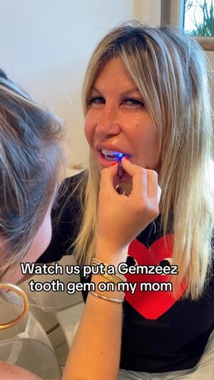 Allie Kaplan Instagram - In honor of Mother’s Day! Happy Mother’s Day to the best mama in the whole world! 🥹💕 she let us test our new product, DIY tooth gems on her before we started @gemzeez 🥹😍 thank you for your endless support and unconditional love 💕🥰🥹 
.
.
.
.
#mothersday #motherslove #momsofinstagram #toothgems #toothgem #toothgemkit #gemzeez