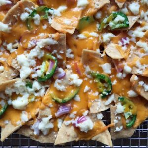 Alton Brown Instagram - The key to these crowd-friendly nachos is using aluminum foil to make spacers for separating the oven racks so that maximum cheese meltage is attained. The other thing: fresh oregano. I can’t stress that enough.

#linkinbio #nachosforacrowd #cincodemayoinspired #altonlikesitspicy