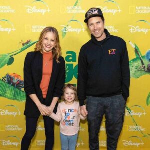Amy Paffrath Instagram - I love this photo from #arealbugslife so much it's going in feed.

It's so nice when the stars align and we get invited to a fun family friendly industry event on a day I have full glam, get photographed and end up in the event recap 'thank you' email 
🕷️🦋🪲🐜🦖

Truly had the best time at the @nhmla with my hubs (rocking my sweatshirt 😆) sis @flywithbritt96   many friends whom I sadly didn't capture moments with. 

Ember has lots of questions about the ants 
( butterflies 🫣)