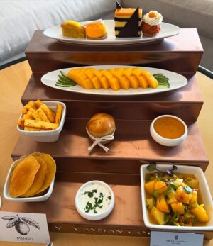 Andrew Zimmern Instagram - Mangoes. 10 ways. The mango aguachile and the mango jam/foie with a mango bread ‘knot’ were my faves. Thank you @ritzcarltongrandcayman 
What’s your favorite way to eat mangoes?
