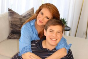 Angie Everhart Instagram - The Mom’s Club: the best club I’ve ever joined! 

My life changed for the better the moment I had Kayden ☺️🌹 

Happy Mother’s Day to all the moms … and a major shoutout to my mom … the best person I know.. My mom is truly one of the greatest humans on the planet. And not only is she a great mother, she’s also an unbelievable  grandmother.

 #ILoveYouMore #MyEverhart #HappyMothersDay