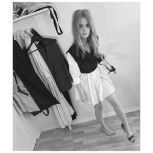 Anita Briem Instagram - Thank you @aocfashion for my beautiful opening week attire 🖤🤍 I just love this Icelandic designer. Well, anyone who gives tops off an outfit with a harness is a-ok by me 🔥 
. 
#absenceofcolor #icelandicdesign #harness #harnesslingerie #blackandwhite @heba.hallgrims @aoc.iceland
