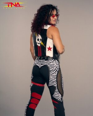Ann Khozine Instagram - Shout out to @ringgeargorilla making me this awesome replica of Dyanmitd Kid’s vest! I have been wanting to have this made for several years & it came out as on point as could be. 🧨🔥 follow & message their account for all of your ring wear needs 📥