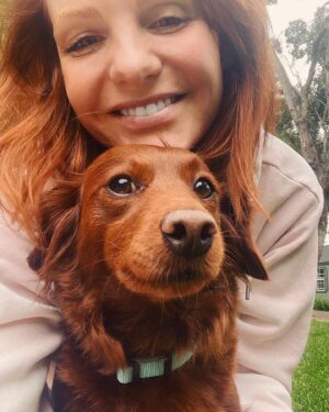 Anne Leighton Instagram - Matchy-matchy with the Rosie, chillin’ at the Chateau des Roses 👩🏻‍🦰🌹🐶 #dogs #are #forever #love #bugs #rosie #redhead