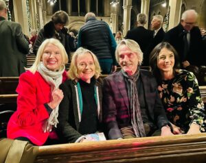 Anneka Rice Instagram - Joyful carol service last night to raise money for @horatiosgarden - the charity that creates breathtakingly beautiful  hospital gardens for patients with spinal injuries. These gardens are an oasis of calm and beauty  for patients who might otherwise be on their backs in bed for up to a year. Beds can be wheeled out and family can come to visit. The gardens give space for patients to come to terms with their life-changing injuries. I read ‘There Must be Honesty in kindness’ by Augustine J. Bowe. I’m in a pew sandwich with Sinead Cusack, Jeremy Irons, and Olivia Chapple, the inspiring founder…#horatiosgarden #charity #green #greenspace #oasis #poetry #kindness