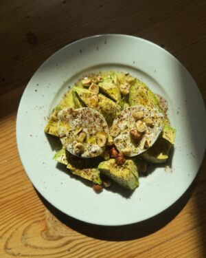 Annie Starke Instagram - Was craving something with avocado and wouldn’t ya know it… I found some burrata. Topped errythang with Spanish olive oil, orange vinegar, smoked s/p, sumac   toasted hazelnuts for cronch. 

10/10 no notes.