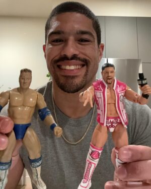 Anthony Bowens Instagram - When I was a kid, I use to pretend this Rocky Maivia @therock action figure (left) was me. It was the only figure that I thought looked like me. Now I don’t have to pretend anymore. 

THANK YOU to every single person who has purchased the brand new Acclaimed 3-pack and pre-ordered my first solo figure. Seeing people unboxing these is a dream come true. 🔫🔫✂️👆#AEW