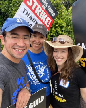 April Billingsley Instagram - I ran into some #FSUFilm school friends who are WGA on the picket line at Paramount on Monday! @zayasnick and #erincancino FSU represent! 
I believe the quote from Erin was was “I thought I’d run out of people I could run into”. I do now really wish we had somewhere to picket in Atlanta because it was really good for my moral to walk back forth with a sign and feel like I was doing something. We’ve had rallies that were great here in Atlanta, but being on the actual picket line, it was a bit of a different vibe and it was really nice. At Paramount the “special picket” for the day was a “Character Actor’s March” so my character actor name I put on my name tag was “girl who dies” and my friend @annunziataactor Nunzi’s was “crack addict” 🤣 Because pickets only happen on weekday mornings I was only able to go to one and I’m really glad I did. @fsufilm #sagaftrastrong #wgastrike
