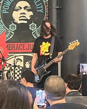 April Schutte Instagram - Well, I finally got to see @dogstarband live 😭 What a gift! (Swipe!) Thank you to @bretdomrose @robmailhouse and Keanu Reeves for giving us this special show at @amoebahollywood !!! I’m forever grateful to my pal, Jax for getting my cd/ticket for me and for @vanessaburgundy for the heads up that the show was happening!! I had to hold back some happy tears but I just kept singing and dancing!!! Hope to get another chance to see them in the future!
.
.
.
#Dogstar #keanu #amoebamusic #bretdomrose #robmailhouse #rockshow