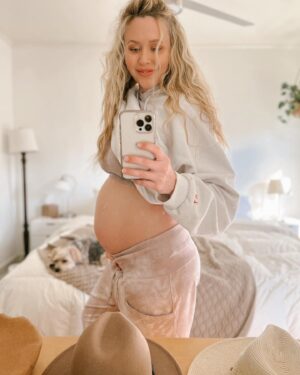 Aqueela Zoll Instagram - A little stroll down memory lane 🤎 7 months pregnant, 8 months pregnant, 5 days before I had Rozlo, her as a newborn, her now, & my “babies are magic & a miracle” face xx
