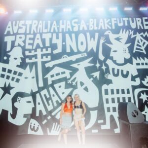 Aretha Brown Instagram - AUSTRALIA HAS A BLACK FUTURE - TREATY NOW 

NEW WORK FOR @amylandthesniffers - HANDMADE IN TORONTO, CANADA JULY 2023 

FULL ARTIST STATEMENT IN MY BIO - GIVE IT A READ - ITS A FREE PDF ! By me & @caltexcowgirll :—)) 

_______________________________________________________________________________________

Had the honour of painting the new Sniffers banner in Canada for their upcoming tour. 

Has been so much fun working/traveling alongside such a deadly group of Aussie artists. 

Thanks to everyone for getting this project off the ground. 

Photos by - @caltexcowgirll   @tyler.internet 

Space - @anex_works