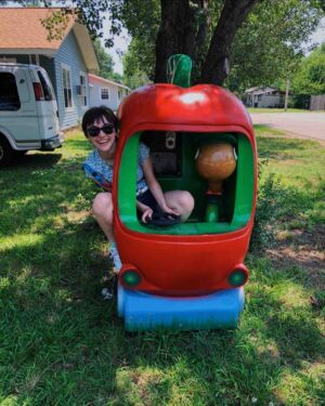 Ashley Boettcher Instagram - new car and an old friend🍎🪱
.
does anyone else remember Busytown?! Lowly Worm is the best, just sayin