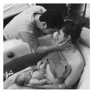 Ashlynn Yennie Instagram - 🎉5!!!!🎉 Holy WOW! I can’t believe 5 years ago at 3:05 am Halloween morning I birthed a beautiful baby girl in a tub full of warm water, surrounded by twinkle lights while Michael repeatedly said Lavender to me before I quietly told him to shhhhhhhh in between contractions ( in his defense that was what he was taught to say from our hypnobirthing classes lol ) 
It’s said by many mamas when you give birth your heart is now living outside of your body and that is absolutely what it feels like. She’s the best thing to ever happen to me and continues to be my greatest teacher in life. 🥹❤️🎂
#birthdaybath #halloweenbaby